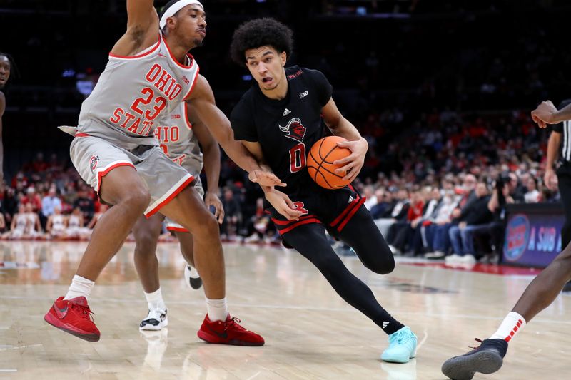 Jan 3, 2024; Columbus, Ohio, USA; Rutgers Scarlet Knights guard Derek Simpson (0) controls the ball as Ohio State Buckeyes forward Zed Key (23) defends during the first half at Value City Arena. Mandatory Credit: Joseph Maiorana-USA TODAY Sports