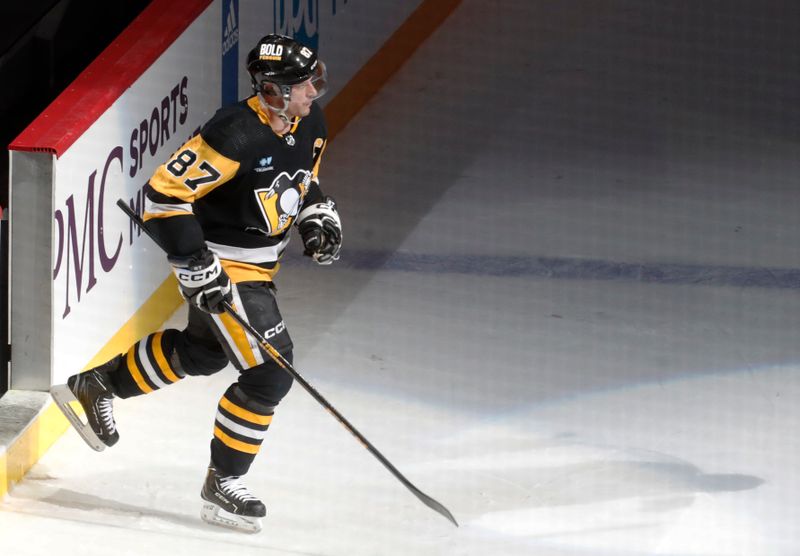 Mar 17, 2024; Pittsburgh, Pennsylvania, USA;  Pittsburgh Penguins center Sidney Crosby (87) returns to the ice after being named first star of the game against the Detroit Red Wings at PPG Paints Arena. Pittsburgh won 6-3. Mandatory Credit: Charles LeClaire-USA TODAY Sports 