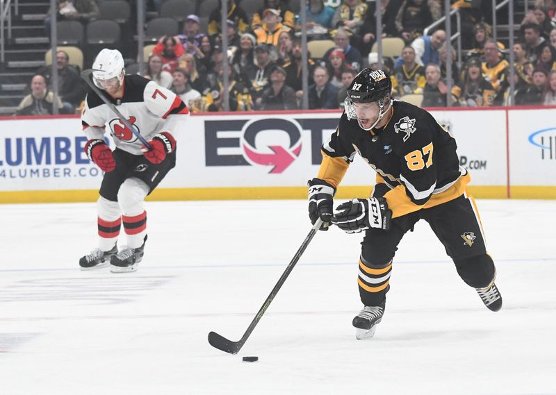 Nov 16, 2023; Pittsburgh, Pennsylvania, USA; Pittsburgh Penguins center Sidney Crosby (87) skates with the puck against the New Jersey Devils during the first period at PPG Paints Arena. Mandatory Credit: Philip G. Pavely-USA TODAY Sports