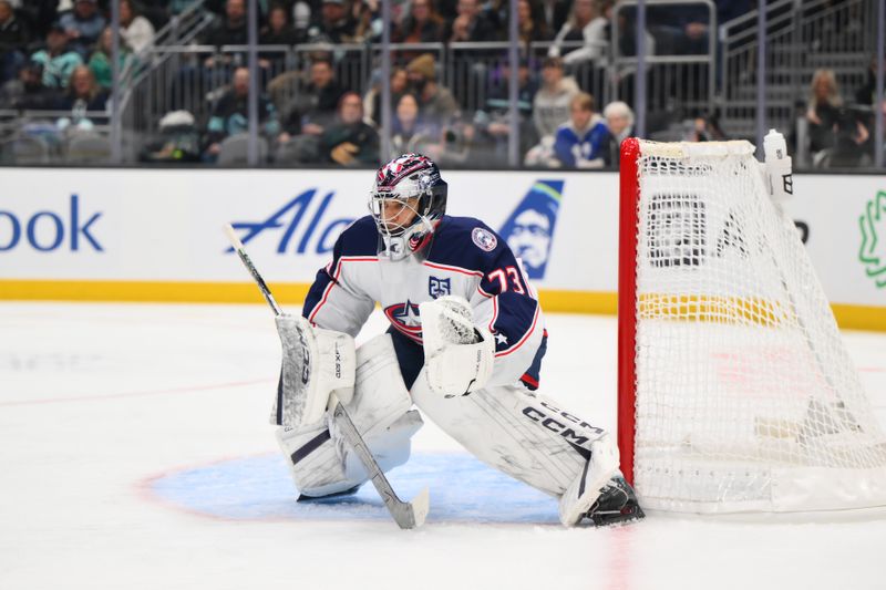 Nov 11, 2025; Seattle, Washington, USA; Columbus Blue Jackets goaltender Jet Greaves (73) defends the goal during the second period against the Seattle Kraken at Climate Pledge Arena. Mandatory Credit: Steven Bisig-Imagn Images Nov 11, 2025; Seattle, Washington, USA; Columbus Blue Jackets goaltender Jet Greaves (73) defends the goal during the second period against the Seattle Kraken at Climate Pledge Arena. Mandatory Credit: Steven Bisig-Imagn Images