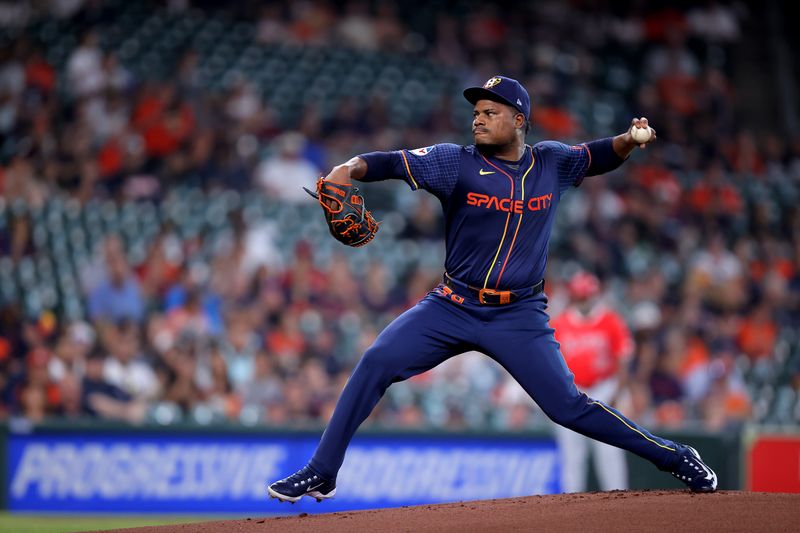 May 20, 2024; Houston, Texas, USA; Houston Astros starting pitcher Framber Valdez (59) delivers a pitch against the Los Angeles Angels during the first inning at Minute Maid Park. Mandatory Credit: Erik Williams-USA TODAY Sports