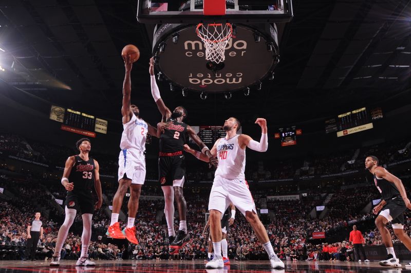 PORTLAND, OR - MARCH 20: Kawhi Leonard #2 of the LA Clippers drives to the basket during the game against the Portland Trail Blazers on March 20, 2024 at the Moda Center Arena in Portland, Oregon. NOTE TO USER: User expressly acknowledges and agrees that, by downloading and or using this photograph, user is consenting to the terms and conditions of the Getty Images License Agreement. Mandatory Copyright Notice: Copyright 2024 NBAE (Photo by Cameron Browne/NBAE via Getty Images)