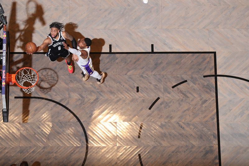 BROOKLYN, NY - MARCH 31: Trendon Watford #9 of the Brooklyn Nets goes to the basket during the game on March 31, 2024 at Barclays Center in Brooklyn, New York. NOTE TO USER: User expressly acknowledges and agrees that, by downloading and or using this Photograph, user is consenting to the terms and conditions of the Getty Images License Agreement. Mandatory Copyright Notice: Copyright 2024 NBAE (Photo by Nathaniel S. Butler/NBAE via Getty Images)