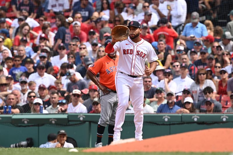 Aug 11, 2024; Boston, Massachusetts, USA; Boston Red Sox first baseman Dominic Smith (2) makes a catch for an out against the Houston Astros during the fourth inning at Fenway Park. Mandatory Credit: Eric Canha-USA TODAY Sports