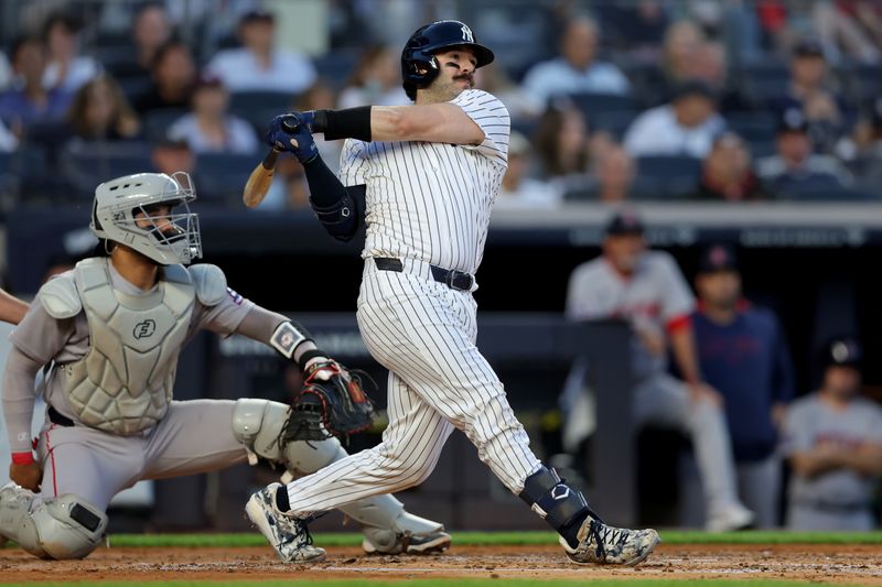 Jun 7, 2025; Bronx, New York, USA; New York Yankees catcher Austin Wells (28) follows through on a three run home run against the Boston Red Sox during the second inning at Yankee Stadium. Mandatory Credit: Brad Penner-Imagn Images