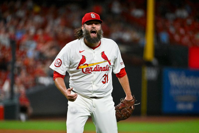 Sep 17, 2024; St. Louis, Missouri, USA;  St. Louis Cardinals starting pitcher Lance Lynn (31) reacts after inning ending double play against the Pittsburgh Pirates during the fifth inning at Busch Stadium. Mandatory Credit: Jeff Curry-Imagn Images