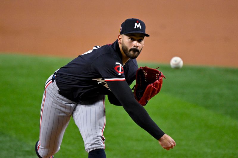 Aug 18, 2024; Arlington, Texas, USA; Minnesota Twins starting pitcher Pablo Lopez (49) pitches against the Texas Rangers during the first inning at Globe Life Field. Mandatory Credit: Jerome Miron-USA TODAY Sports