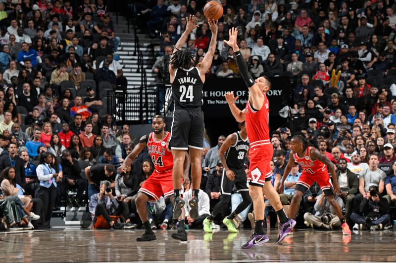 BROOKLYN, NY - NOVEMBER 9: Cam Thomas #24 of the Brooklyn Nets shoots a three point basket during the game  against the Chicago Bulls on November 9, 2024 at Barclays Center in Brooklyn, New York. NOTE TO USER: User expressly acknowledges and agrees that, by downloading and or using this Photograph, user is consenting to the terms and conditions of the Getty Images License Agreement. Mandatory Copyright Notice: Copyright 2024 NBAE (Photo by David Dow/NBAE via Getty Images)