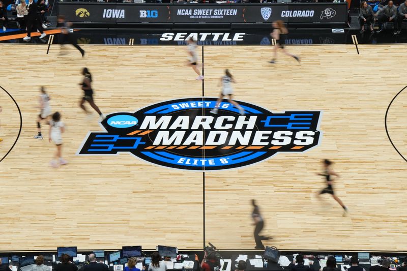 Mar 24, 2023; Seattle, WA, USA; A general overall view of the March Madness Sweet 16 and Elite 8 logo at center court at Climate Pledge Arena. Mandatory Credit: Kirby Lee-USA TODAY Sports