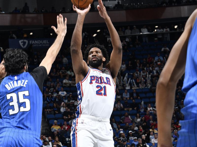 ORLANDO, FL - NOVEMBER 15: Joel Embiid #21 of the Philadelphia 76ers shoots the ball during the game against the Orlando Magic during the Emirates NBA Cup game on  November 15, 2024 at Kia Center in Orlando, Florida. NOTE TO USER: User expressly acknowledges and agrees that, by downloading and or using this photograph, User is consenting to the terms and conditions of the Getty Images License Agreement. Mandatory Copyright Notice: Copyright 2024 NBAE (Photo by Fernando Medina/NBAE via Getty Images)