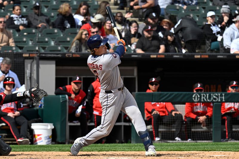 May 3, 2025; Chicago, Illinois, USA;  Houston Astros outfielder Jake Meyers (6) hits an RBI double during the eighth inning against the Chicago White Sox at Rate Field. Mandatory Credit: Matt Marton-Imagn Images