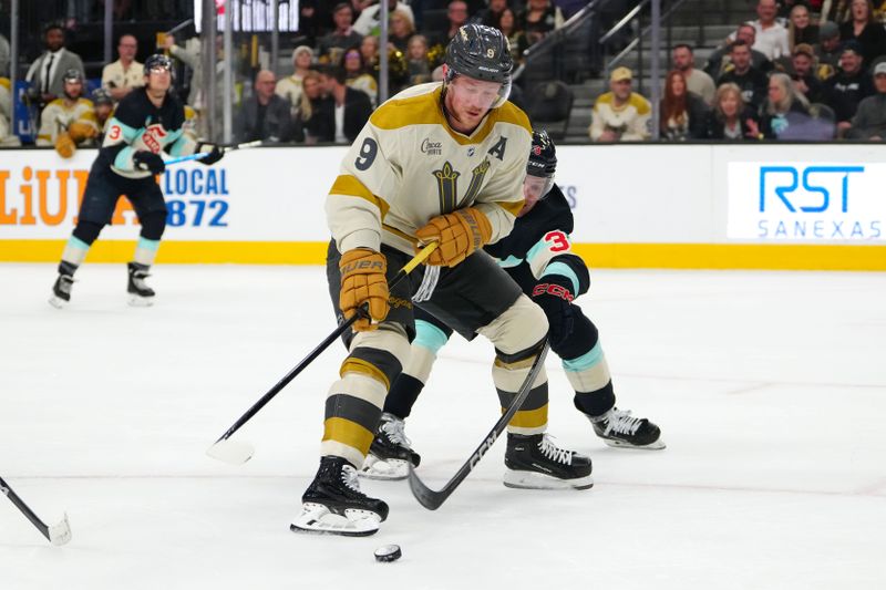 Mar 21, 2024; Las Vegas, Nevada, USA; Seattle Kraken defenseman Will Borgen (3) attempts to stop a breakaway by Vegas Golden Knights center Jack Eichel (9) during the second period at T-Mobile Arena. Mandatory Credit: Stephen R. Sylvanie-USA TODAY Sports