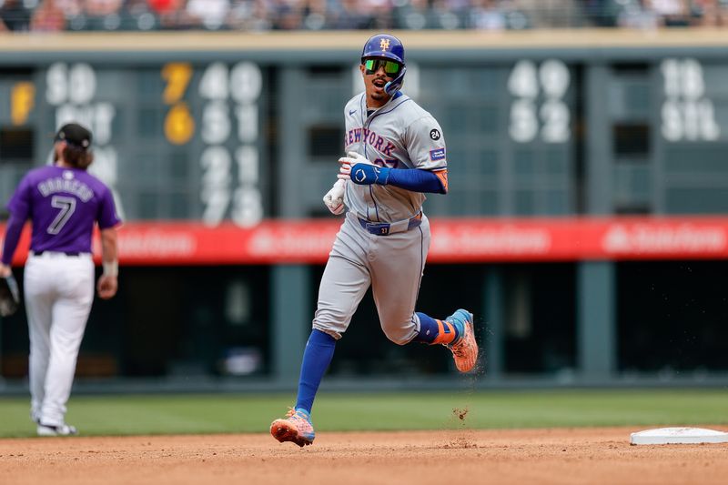 Aug 8, 2024; Denver, Colorado, USA; New York Mets third baseman Mark Vientos (27) rounds the bases on a two run home run in the fifth inning against the Colorado Rockies at Coors Field. Mandatory Credit: Isaiah J. Downing-USA TODAY Sports