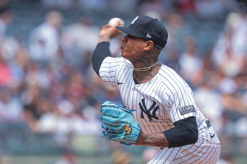 Aug 11, 2024; Bronx, New York, USA; New York Yankees starting pitcher Marcus Stroman (0) delivers a pitch during the first inning against the Texas Rangers at Yankee Stadium. Mandatory Credit: Vincent Carchietta-USA TODAY Sports