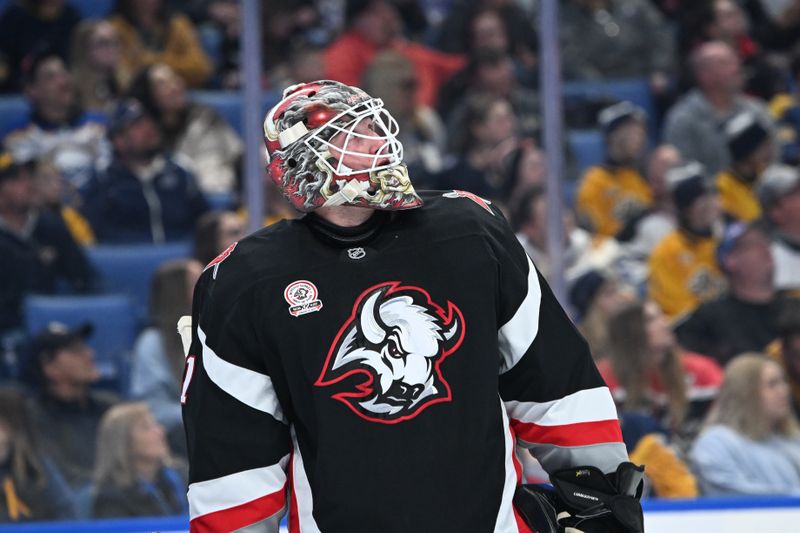 Jan 31, 2025; Buffalo, New York, USA; Buffalo Sabres goaltender Ukko-Pekka Luukkonen (1) looks to the svoreboard in the first period game against the Nashville Predators at the KeyBank Center. Mandatory Credit: Mark Konezny-Imagn Images