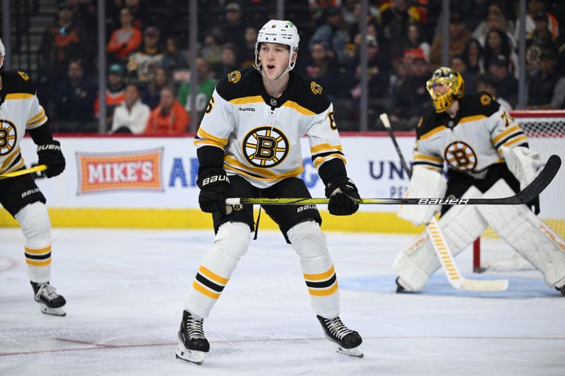 Nov 2, 2024; Philadelphia, Pennsylvania, USA; Boston Bruins defenseman Mason Lohrei (6) in action against the Philadelphia Flyers in the second period at Wells Fargo Center. Mandatory Credit: Kyle Ross-Imagn Images
