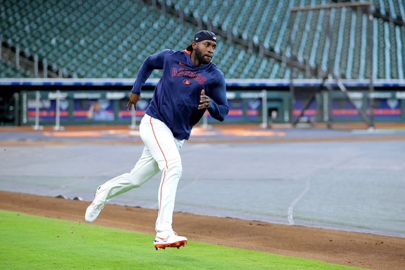 May 23, 2025; Houston, Texas, USA; Houston Astros designated hitter Yordan Alvarez (44) works out prior to the game against the Seattle Mariners at Daikin Park. Mandatory Credit: Erik Williams-Imagn Images
