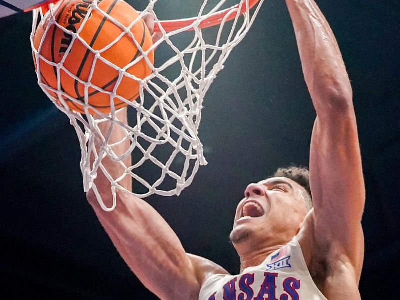 Dec 22, 2023; Lawrence, Kansas, USA; Kansas Jayhawks guard Kevin McCullar Jr. (15) dunks the ball against the Yale Bulldogs during the second half at Allen Fieldhouse. Mandatory Credit: Denny Medley-USA TODAY Sports