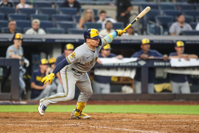 Sep 9, 2023; Bronx, New York, USA;  Milwaukee Brewers catcher William Contreras (24) hits a two-run single in the ninth inning New York Yankees at Yankee Stadium. Mandatory Credit: Wendell Cruz-USA TODAY Sports