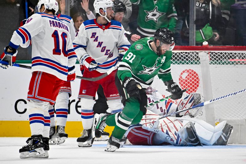 Nov 20, 2023; Dallas, Texas, USA; Dallas Stars center Tyler Seguin (91) reacts to scoring a goal against New York Rangers goaltender Igor Shesterkin (31) during the third period at the American Airlines Center. Mandatory Credit: Jerome Miron-USA TODAY Sports