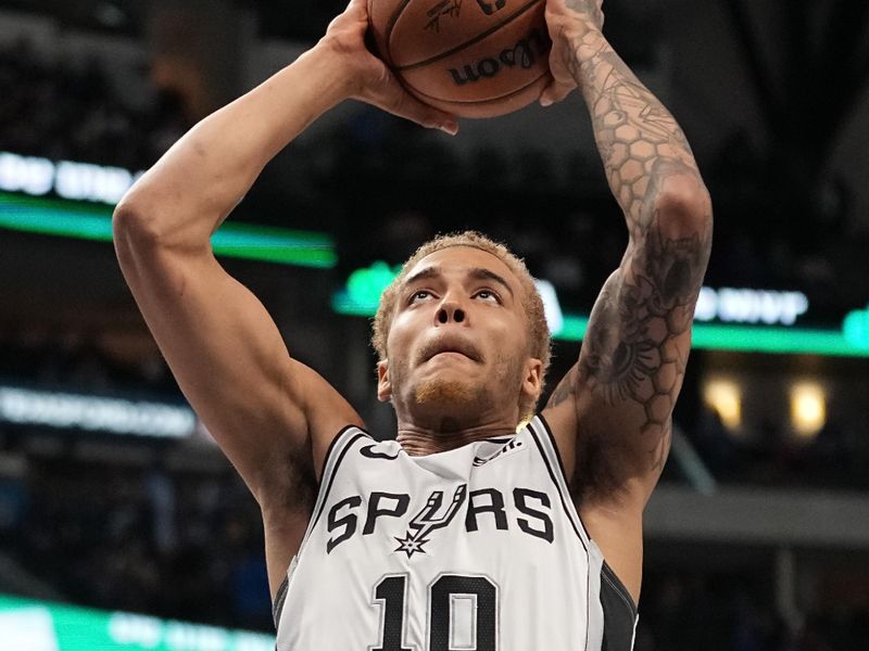 DALLAS, TEXAS - DECEMBER 23: Jeremy Sochan #10 of the San Antonio Spurs makes a move to the basket during the first half of the game against the Dallas Mavericks at American Airlines Center on December 23, 2023 in Dallas, Texas. NOTE TO USER: User expressly acknowledges and agrees that, by downloading and or using this photograph, User is consenting to the terms and conditions of the Getty Images License Agreement.  (Photo by Sam Hodde/Getty Images)