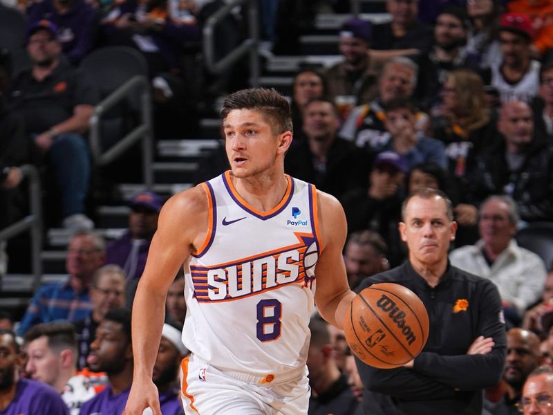 PHOENIX, AZ - JANUARY 22: Grayson Allen #8 of the Phoenix Suns dribbles the ball during the game against the Chicago Bulls on January 22, 2024 at Footprint Center in Phoenix, Arizona. NOTE TO USER: User expressly acknowledges and agrees that, by downloading and or using this photograph, user is consenting to the terms and conditions of the Getty Images License Agreement. Mandatory Copyright Notice: Copyright 2024 NBAE (Photo by Garrett Ellwood/NBAE via Getty Images)