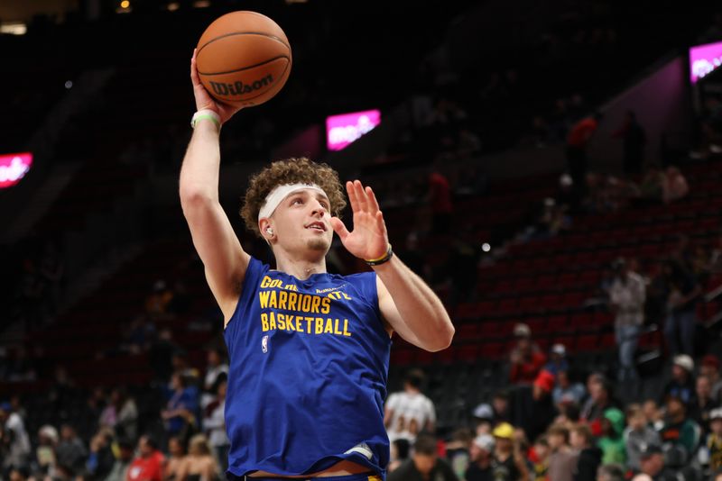 PORTLAND, OREGON - APRIL 11: Brandin Podziemski #2 of the Golden State Warriors warms up before a game against the Portland Trail Blazers at Moda Center on April 11, 2024 in Portland, Oregon. NOTE TO USER: User expressly acknowledges and agrees that, by downloading and or using this photograph, User is consenting to the terms and conditions of the Getty Images License Agreement.? (Photo by Amanda Loman/Getty Images)