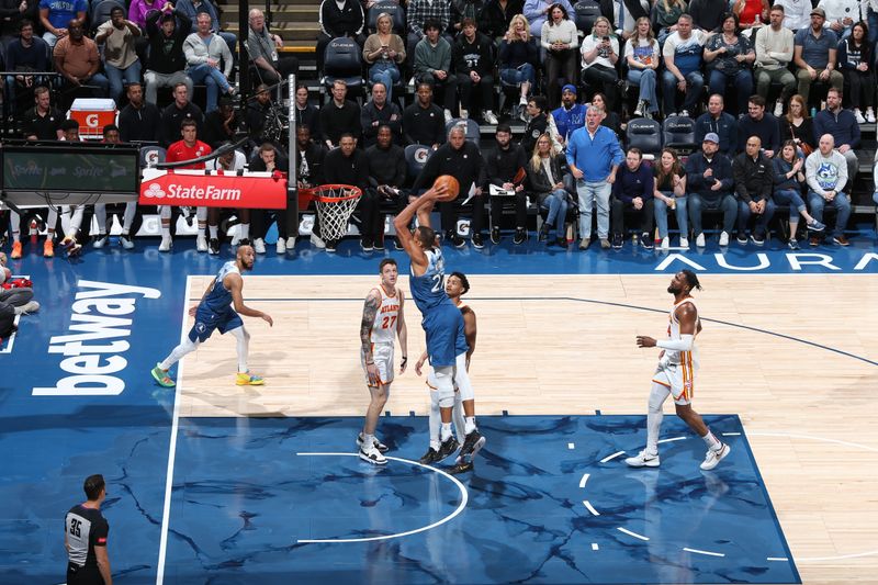 MINNEAPOLIS, MN -  APRIL 12: Rudy Gobert #27 of the Minnesota Timberwolves dunks the ball during the game against the Atlanta Hawks on April 12, 2024 at Target Center in Minneapolis, Minnesota. NOTE TO USER: User expressly acknowledges and agrees that, by downloading and or using this Photograph, user is consenting to the terms and conditions of the Getty Images License Agreement. Mandatory Copyright Notice: Copyright 2024 NBAE (Photo by David Sherman/NBAE via Getty Images)