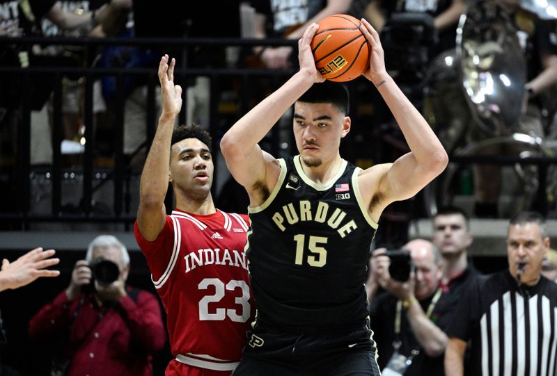 Feb 25, 2023; West Lafayette, Indiana, USA; Purdue Boilermakers center Zach Edey (15) controls the ball againstIndiana Hoosiers forward Trayce Jackson-Davis (23) during the first half at Mackey Arena. Mandatory Credit: Marc Lebryk-USA TODAY Sports