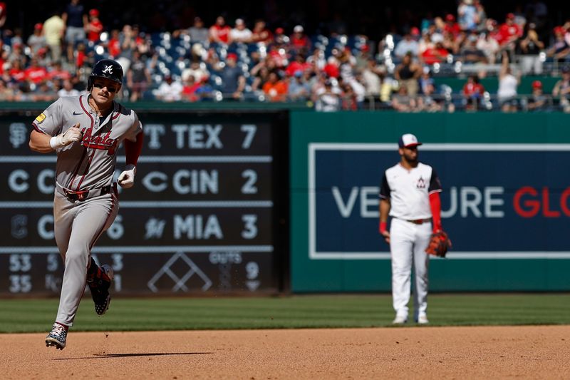 Jun 9, 2024; Washington, District of Columbia, USA; Atlanta Braves left fielder Jarred Kelenic (24) rounds the bases after hitting a three run home run against the Washington Nationals during the ninth inning at Nationals Park. Mandatory Credit: Geoff Burke-USA TODAY Sports