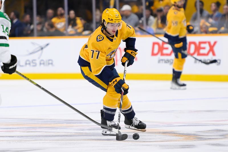 Oct 10, 2024; Nashville, Tennessee, USA;  Nashville Predators right wing Luke Evangelista (77) skates against the Dallas Stars during the first period at Bridgestone Arena. Mandatory Credit: Steve Roberts-Imagn Images