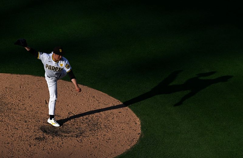 Jun 22, 2024; San Diego, California, USA; San Diego Padres relief pitcher Yuki Matsui (1) pitches against the Milwaukee Brewers during the seventh inning at Petco Park. Mandatory Credit: Orlando Ramirez-USA TODAY Sports