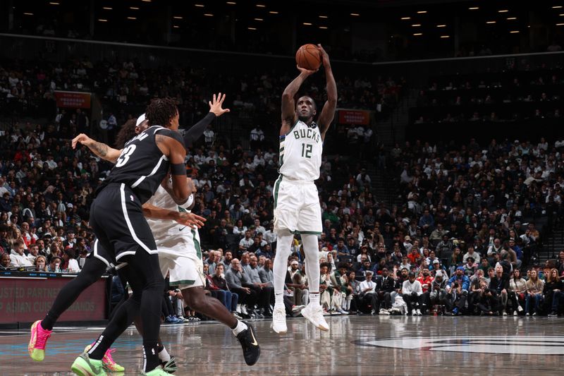 BROOKLYN, NY - OCTOBER 27: Taurean Prince #12 of the Milwaukee Bucks shoots a three point basket during the game against the Brooklyn Nets on October 27, 2024 at Barclays Center in Brooklyn, New York. NOTE TO USER: User expressly acknowledges and agrees that, by downloading and or using this Photograph, user is consenting to the terms and conditions of the Getty Images License Agreement. Mandatory Copyright Notice: Copyright 2024 NBAE (Photo by Nathaniel S. Butler/NBAE via Getty Images)