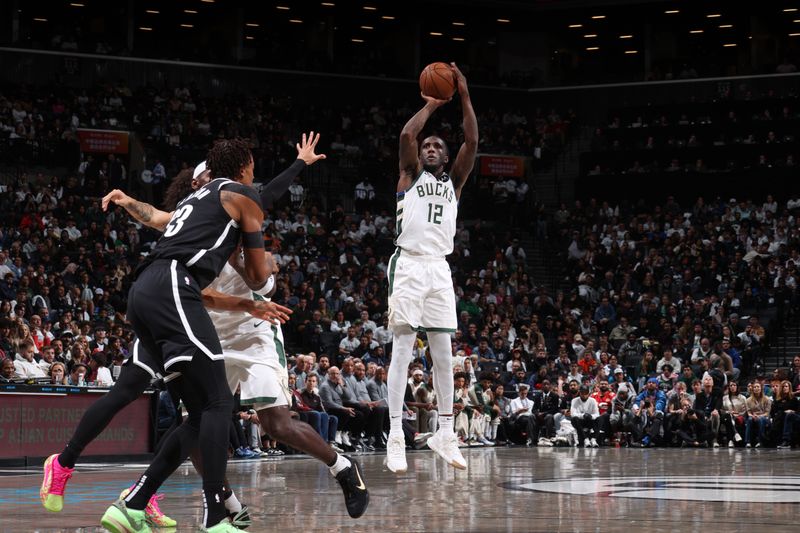 BROOKLYN, NY - OCTOBER 27: Taurean Prince #12 of the Milwaukee Bucks shoots a three point basket during the game against the Brooklyn Nets on October 27, 2024 at Barclays Center in Brooklyn, New York. NOTE TO USER: User expressly acknowledges and agrees that, by downloading and or using this Photograph, user is consenting to the terms and conditions of the Getty Images License Agreement. Mandatory Copyright Notice: Copyright 2024 NBAE (Photo by Nathaniel S. Butler/NBAE via Getty Images)