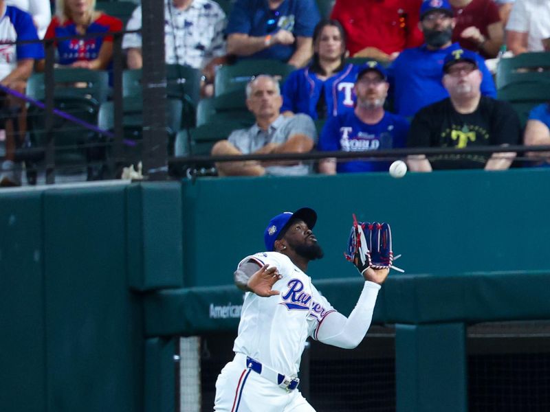 Jun 5, 2024; Arlington, Texas, USA;  Texas Rangers outfielder Adolis Garcia (53) makes a catch during the first inning against the Detroit Tigers at Globe Life Field. Mandatory Credit: Kevin Jairaj-USA TODAY Sports
