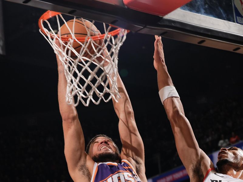 PHOENIX, AZ - NOVEMBER 2: Devin Booker #1 of the Phoenix Suns dunks the ball during the game against the Portland Trail Blazers on November 2, 2024 at Footprint Center in Phoenix, Arizona. NOTE TO USER: User expressly acknowledges and agrees that, by downloading and or using this photograph, user is consenting to the terms and conditions of the Getty Images License Agreement. Mandatory Copyright Notice: Copyright 2024 NBAE (Photo by Kate Frese/NBAE via Getty Images)