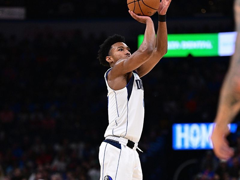 OKLAHOMA CITY, OKLAHOMA - APRIL 14: Brandon Williams #00 of the Dallas Mavericks puts up a shot during the second half against the Oklahoma City Thunder at Paycom Center on April 14, 2024 in Oklahoma City, Oklahoma. NOTE TO USER: User expressly acknowledges and agrees that, by downloading and or using this Photograph, user is consenting to the terms and conditions of the Getty Images License Agreement. (Photo by Joshua Gateley/Getty Images)