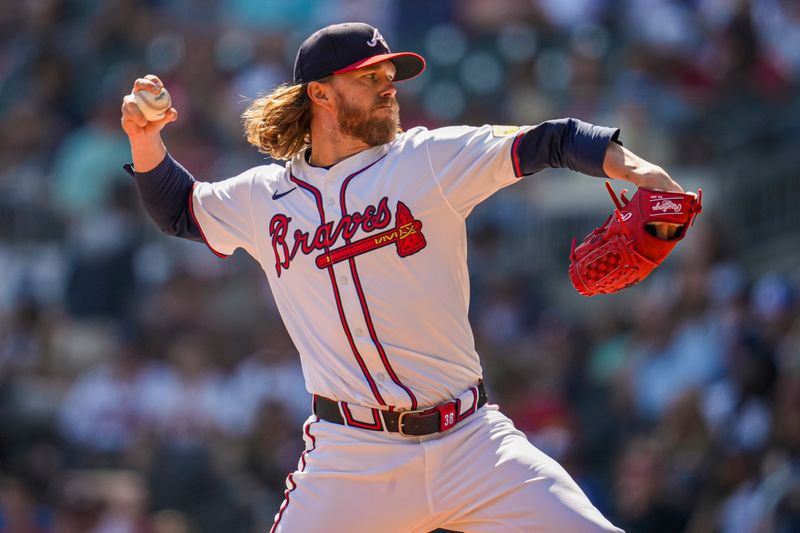 Apr 7, 2024; Cumberland, Georgia, USA; Atlanta Braves relief pitcher Pierce Johnson (38) pitches against the Arizona Diamondbacks during the ninth inning at Truist Park. Mandatory Credit: Dale Zanine-USA TODAY Sports