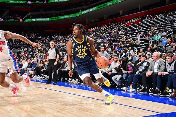 DETROIT, MI - DECEMBER 11: Aaron Nesmith #23 of the Indiana Pacers drives to the basket during the game against the Detroit Pistons on December 11, 2023 at Little Caesars Arena in Detroit, Michigan. NOTE TO USER: User expressly acknowledges and agrees that, by downloading and/or using this photograph, User is consenting to the terms and conditions of the Getty Images License Agreement. Mandatory Copyright Notice: Copyright 2023 NBAE (Photo by Chris Schwegler/NBAE via Getty Images)