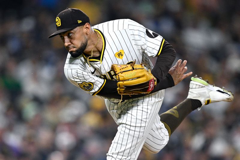 Aug 13, 2024; San Diego, California, USA; San Diego Padres relief pitcher Robert Suarez (75) pitches against the Pittsburgh Pirates during the ninth inning at Petco Park. Mandatory Credit: Orlando Ramirez-USA TODAY Sports