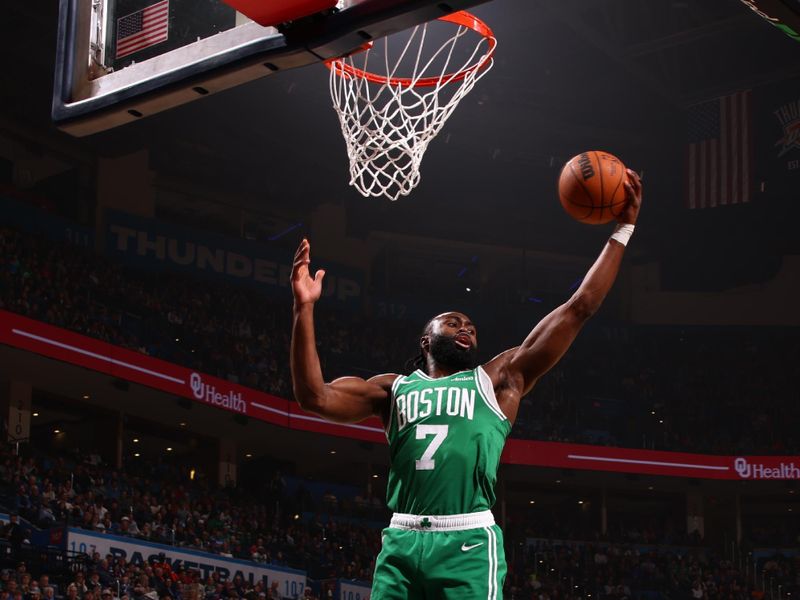 OKLAHOMA CITY, OK - JANUARY 5: Jaylen Brown #7 of the Boston Celtics rebounds the ball during the game against the Oklahoma City Thunder on January 5, 2025 at Paycom Center in Oklahoma City, Oklahoma. NOTE TO USER: User expressly acknowledges and agrees that, by downloading and or using this photograph, User is consenting to the terms and conditions of the Getty Images License Agreement. Mandatory Copyright Notice: Copyright 2025 NBAE (Photo by Zach Beeker/NBAE via Getty Images)