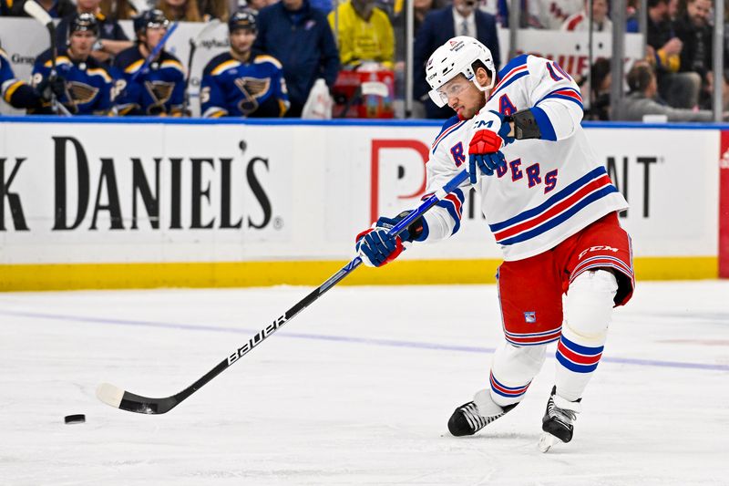 Jan 11, 2024; St. Louis, Missouri, USA;  New York Rangers left wing Artemi Panarin (10) shoots against the St. Louis Blues during the third period at Enterprise Center. Mandatory Credit: Jeff Curry-USA TODAY Sports