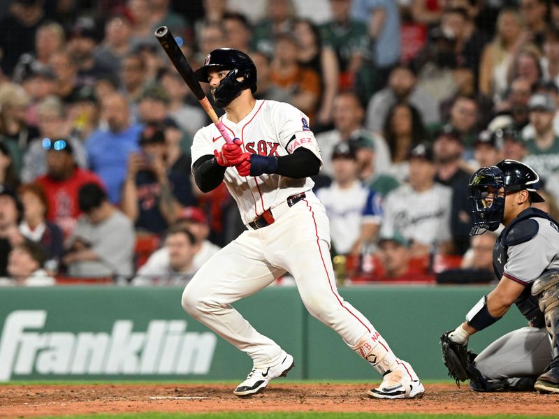 May 17, 2025; Boston, Massachusetts, USA; Boston Red Sox catcher Carlos Narvaez (75) hits a single against the Boston Red Sox during the eighth inning at Fenway Park. Mandatory Credit: Brian Fluharty-Imagn Images