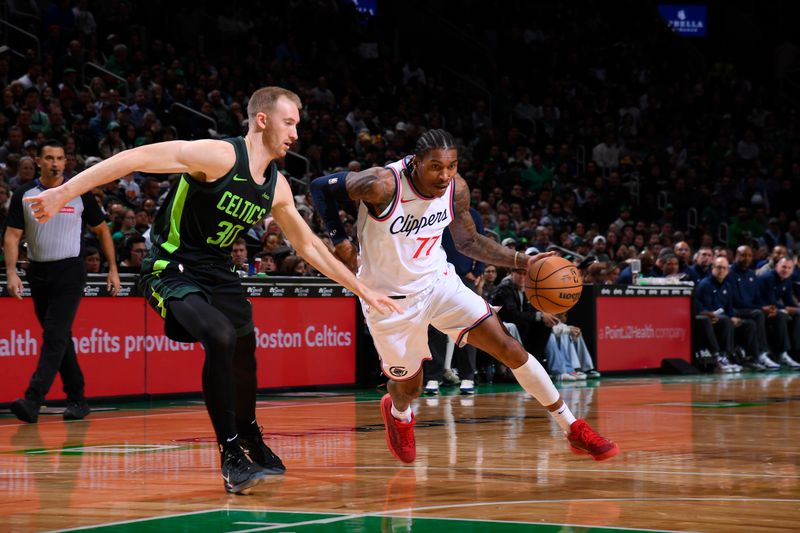 BOSTON, MA - NOVEMBER 25: Kevin Porter Jr. #77 of the LA Clippers handles the ball during the game against the Boston Celtics on November 25, 2024 at TD Garden in Boston, Massachusetts. NOTE TO USER: User expressly acknowledges and agrees that, by downloading and/or using this Photograph, user is consenting to the terms and conditions of the Getty Images License Agreement. Mandatory Copyright Notice: Copyright 2024 NBAE (Photo by Brian Babineau/NBAE via Getty Images)