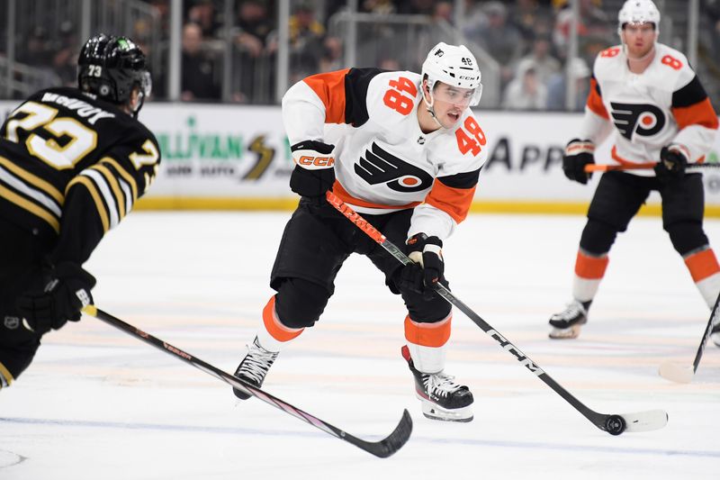 Mar 16, 2024; Boston, Massachusetts, USA; Philadelphia Flyers center Morgan Frost (48) controls the puck during the second period against the Boston Bruins at TD Garden. Mandatory Credit: Bob DeChiara-USA TODAY Sports