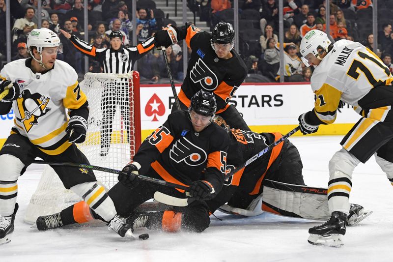 Feb 25, 2025; Philadelphia, Pennsylvania, USA; Philadelphia Flyers defenseman Rasmus Ristolainen (55) blocks short attempt by Pittsburgh Penguins center Evgeni Malkin (71) during the first period at Wells Fargo Center. Mandatory Credit: Eric Hartline-Imagn Images