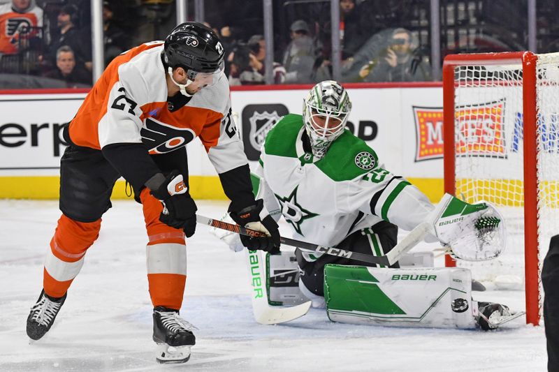 Jan 18, 2024; Philadelphia, Pennsylvania, USA; Dallas Stars goaltender Jake Oettinger (29) makes a save against Philadelphia Flyers left wing Noah Cates (27) during the first period at Wells Fargo Center. Mandatory Credit: Eric Hartline-USA TODAY Sports