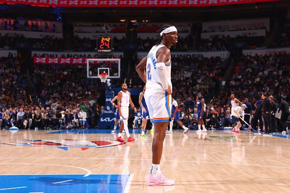 OKLAHOMA CITY, OK - DECEMBER 21: Shai Gilgeous-Alexander #2 of the Oklahoma City Thunder looks on during the game against the LA Clippers on December 21, 2023 at Paycom Arena in Oklahoma City, Oklahoma. NOTE TO USER: User expressly acknowledges and agrees that, by downloading and or using this photograph, User is consenting to the terms and conditions of the Getty Images License Agreement. Mandatory Copyright Notice: Copyright 2023 NBAE (Photo by Zach Beeker/NBAE via Getty Images)