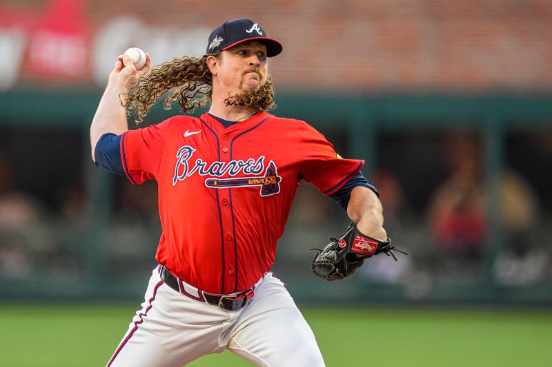 May 30, 2025; Cumberland, Georgia, USA; Atlanta Braves starting pitcher Grant Holmes (66) pitches against the Boston Red Sox during the first inning at Truist Park. Mandatory Credit: Dale Zanine-Imagn Images