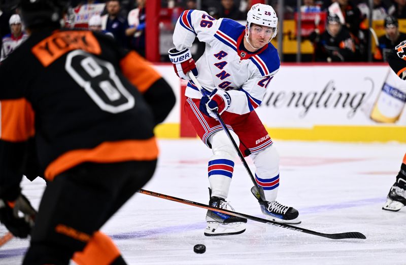 Nov 24, 2023; Philadelphia, Pennsylvania, USA; New York Rangers left wing Jimmy Vesey (26) passes the puck against the Philadelphia Flyers in the first period at Wells Fargo Center. Mandatory Credit: Kyle Ross-USA TODAY Sports